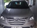 Toyota Innova 2014 - Cần bán gấp Toyota Innova sản xuất năm 2014, màu bạc xe còn mới lắm