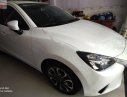 Mazda 2 2016 - Bán ô tô Mazda 2 đời 2016, màu trắng giá cạnh tranh xe còn mới lắm