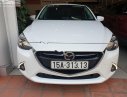 Mazda 2 2017 - Bán Mazda 2 sản xuất 2017, màu trắng số tự động xe còn mới lắm