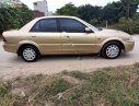 Ford Laser 2001 - Bán Ford Laser năm sản xuất 2001, màu vàng xe gia đình