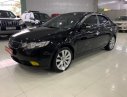 Kia Cerato   2009 - Bán Kia Cerato 1.6 AT năm sản xuất 2009, màu đen, nhập khẩu 