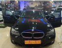 BMW 3 Series 2010 - Cần bán BMW 320i đời 2010, màu đen, nhập khẩu 