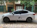Mazda 2 2015 - Cần bán lại xe cũ Mazda 2 sản xuất năm 2015, màu trắng