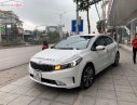 Kia Cerato 2018 - Cần bán lại xe Kia Cerato đời 2018, màu trắng, số sàn, giá tốt