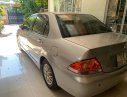 Mitsubishi Lancer   2004 - Cần bán Mitsubishi Lancer GLX 1.6 AT sản xuất 2004, màu bạc xe gia đình