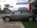 Kia Forte 2011 - Bán xe Kia Forte MT năm 2011, màu xám còn mới