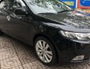 Kia Forte 2011 - Cần bán gấp Kia Forte sản xuất 2011, màu đen