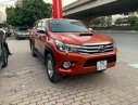 Toyota Hilux   2015 - Bán xe cũ Toyota Hilux 3.0G 4x4 AT năm 2015, màu đỏ, nhập khẩu