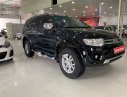 Mitsubishi Pajero Sport G 4x4 AT 2015 - Cần bán lại xe Mitsubishi Pajero Sport G 4x4 AT đời 2015, màu đen