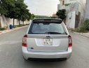 Kia Carens   MT 2009 - Bán ô tô Kia Carens MT đời 2009, màu bạc, giá chỉ 269 triệu