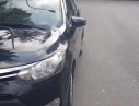 Toyota Vios E 2014 - Cần bán xe Toyota Vios E năm 2014, màu đen số sàn, giá tốt