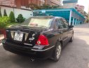 Ford Laser   2005 - Cần bán gấp Ford Laser 1.8AT 2005, màu đen, 230tr