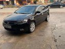 Kia Forte   2010 - Bán xe Kia Forte EX 1.6 MT đời 2010, màu đen, số sàn