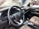 Toyota Hilux   2016 - Cần bán Toyota Hilux 3.0AT 2016, màu đen, nhập khẩu