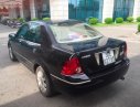 Ford Laser   2005 - Cần bán gấp Ford Laser 1.8AT 2005, màu đen, 230tr