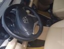 Toyota Vios E 2014 - Cần bán xe Toyota Vios E năm 2014, màu đen số sàn, giá tốt