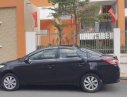 Toyota Vios E 2014 - Cần bán xe Toyota Vios E năm 2014, màu đen số sàn, giá tốt