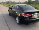 Kia Forte   2010 - Bán xe Kia Forte EX 1.6 MT đời 2010, màu đen, số sàn