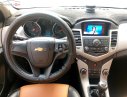 Chevrolet Cruze LT 2015 - Cần bán gấp Chevrolet Cruze LT sản xuất năm 2015, màu đen xe gia đình
