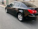 Chevrolet Cruze LT 2015 - Cần bán gấp Chevrolet Cruze LT sản xuất năm 2015, màu đen xe gia đình