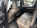 Toyota Hilux   2016 - Cần bán Toyota Hilux 3.0AT 2016, màu đen, nhập khẩu