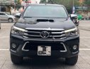 Toyota Hilux   2016 - Cần bán Toyota Hilux 3.0AT 2016, màu đen, nhập khẩu