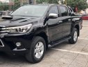 Toyota Hilux   2016 - Cần bán Toyota Hilux 3.0AT 2016, màu đen, nhập khẩu