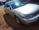 Ford Laser 2002 - Cần bán xe Ford Laser đời 2002, màu bạc còn mới, giá tốt