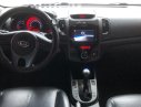 Kia Forte SLi 1.6 AT 2009 - Cần bán lại xe Kia Forte SLi 1.6 AT đời 2009, màu đen, xe nhập