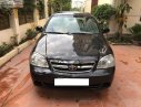 Daewoo Lacetti 2009 - Cần bán gấp Daewoo Lacetti sản xuất 2009, màu đen