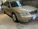 Ford Mondeo 2004 - Bán ô tô Ford Mondeo đời 2004, màu vàng, nhập khẩu