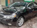 Kia Forte 2010 - Xe Kia Forte SLi 1.6 AT sản xuất năm 2010, màu đen, xe nhập chính chủ, giá tốt