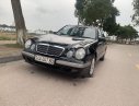 Mercedes-Benz E class 2001 - Cần bán gấp Mercedes sản xuất 2001, màu đen, giá tốt