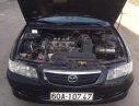 Mazda 626 2.0 MT 2001 - Cần bán lại xe Mazda 626 2.0 MT sản xuất 2001, màu đen, 148tr