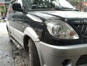 Mitsubishi Jolie 2.0 2004 - Cần bán xe Mitsubishi Jolie 2.0 năm 2004, màu đen, xe nhập xe gia đình