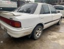 Mazda 323 1994 - Cần bán gấp Mazda 323 đời 1994, màu trắng, xe nhập Nhật