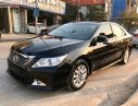 Toyota Camry   2013 - Cần bán lại xe cũ Toyota Camry 2.0E năm 2013, màu đen, giá 660tr