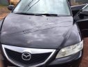 Mazda 6 2003 - Cần bán lại xe Mazda 6 2.0LMT đời 2003, màu đen số sàn