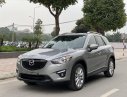 Mazda CX 5 2014 - Cần bán lại xe Mazda CX 5 sản xuất năm 2014, màu bạc, giá chỉ 659 triệu