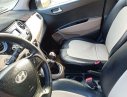 Hyundai Grand i10 2015 - Cần bán gấp Hyundai Grand i10 đời 2015, màu trắng, xe nhập số sàn, giá tốt