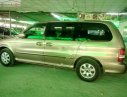 Kia Carnival 2009 - Bán Kia Carnival 2009, màu vàng số tự động