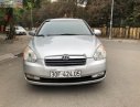 Hyundai Accent 1.4 AT 2009 - Cần bán lại xe Hyundai Accent 1.4 AT đời 2009, màu bạc, xe nhập