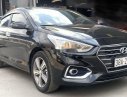 Hyundai Accent  1.4AT    2019 - Bán ô tô Hyundai Accent 1.4AT đời 2019, màu đen như mới, giá tốt
