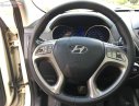 Hyundai Tucson 2.0 AT 2014 - Cần bán lại xe Hyundai Tucson 2.0 AT đời 2014, màu kem (be), nhập khẩu  