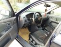 Ford Laser 1999 - Bán Ford Laser năm sản xuất 1999, màu đen xe gia đình