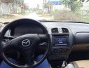 Mazda 323 2003 - Cần bán xe Mazda 323 đời 2003, màu đen