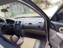 Mazda 323 2003 - Cần bán xe Mazda 323 đời 2003, màu đen