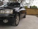 Ford Laser Ghia 1.8 MT 2003 - Cần bán gấp Ford Laser GHIA 1.8 MT năm 2003, màu đen, 132tr