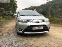 Toyota Vios 1.5E 2014 - Cần bán Toyota Vios E 2014, màu bạc chính chủ, giá tốt