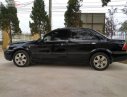 Ford Laser Ghia 1.8 MT 2003 - Cần bán gấp Ford Laser GHIA 1.8 MT năm 2003, màu đen, 132tr